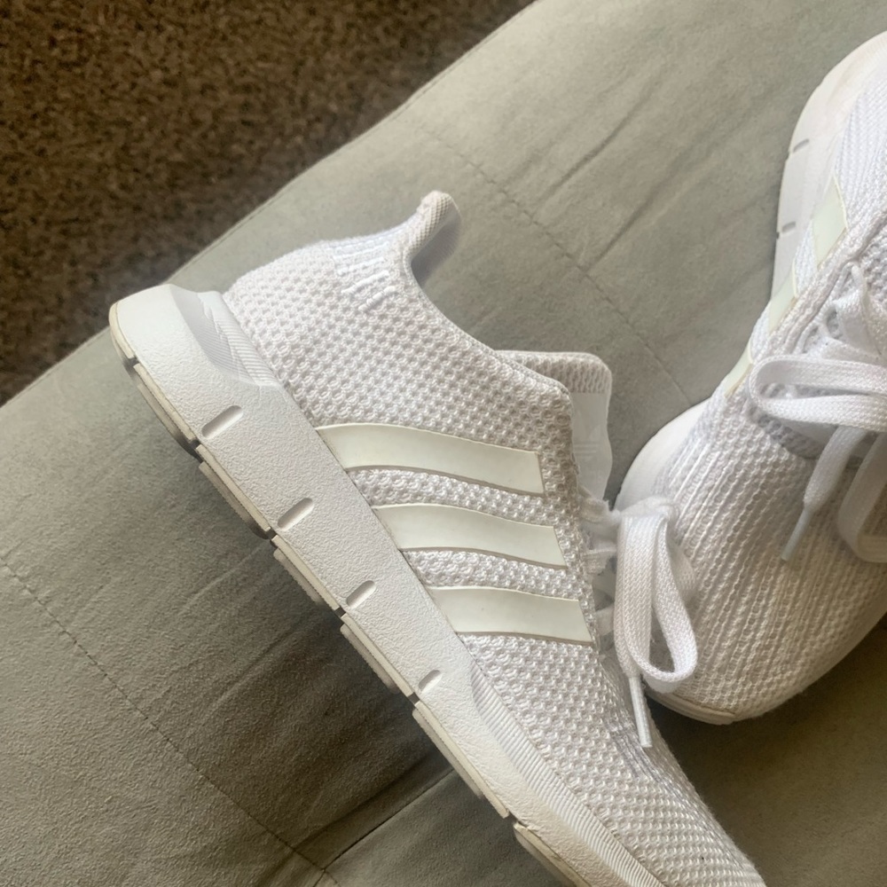 White adidas size 4 in kids or 6.5 in womens